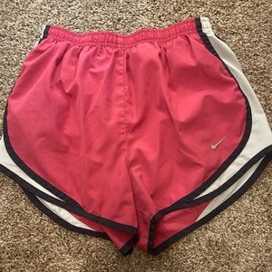 Pink and white nike shorts